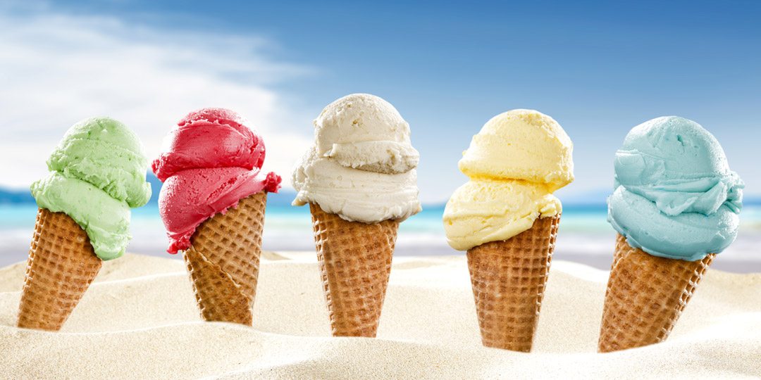 Colorful ice cream cones on beach