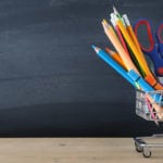 School supplies in shopping cart