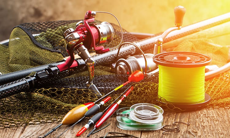 Fly fishing gear laid out on table